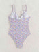 Purple 1950s Ditsy Floral Lace-Up One-Piece Swimsuit — because 1950s glamour never goes out of style