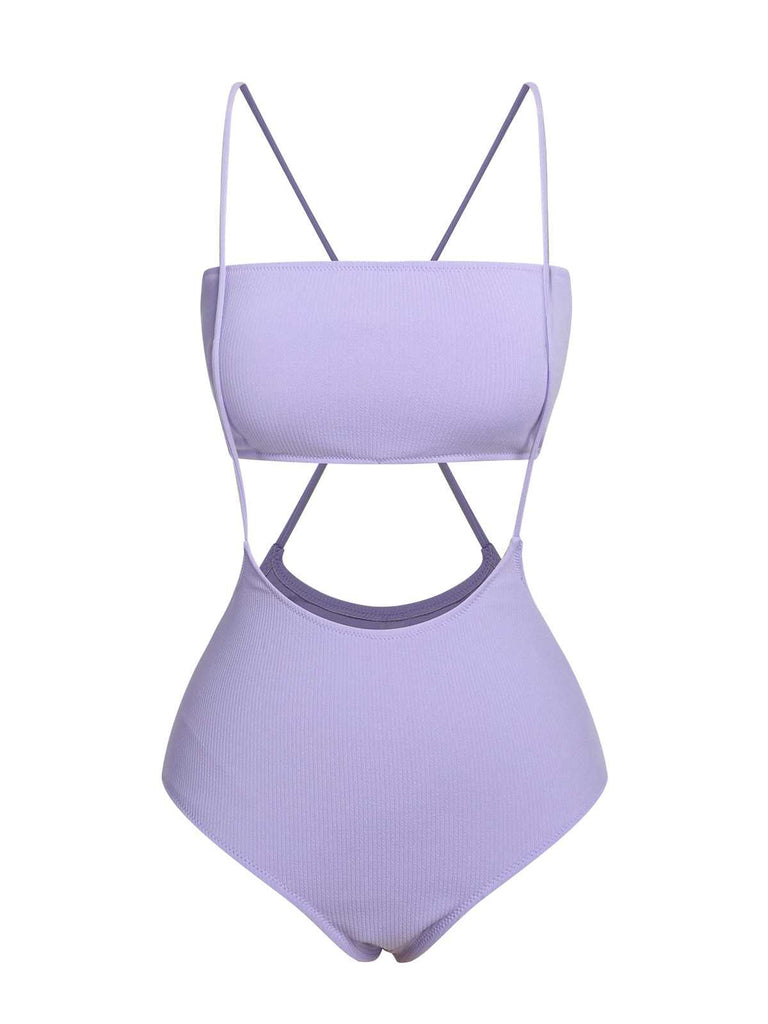 She's wearing Purple 1950s Spaghetti Strap Bandeau Swimsuit and the whole beach remembers the 1950s