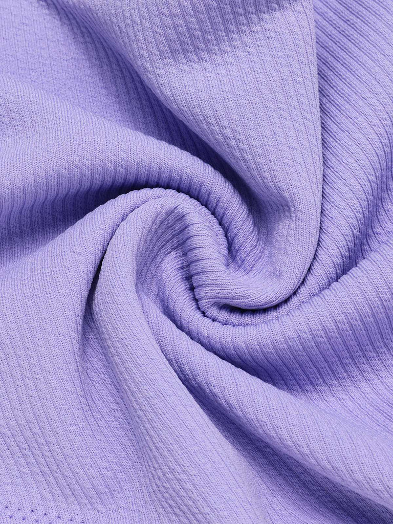 Purple 1950s Spaghetti Strap Bandeau Swimsuit — because 1950s glamour never goes out of style