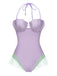 This Purple 1970s Shell Mermaid Bandeau One-Piece Swimsuit carries 1970s vacation dreams in every stitch