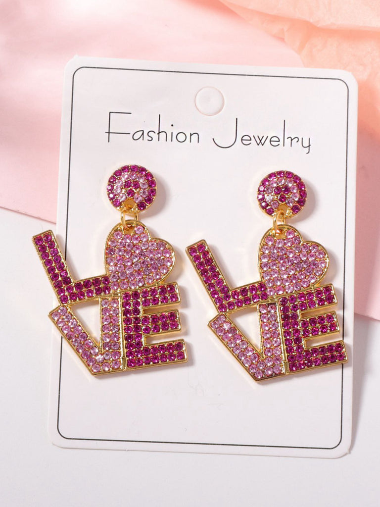 This Purple Rhinestone LOVE Letters Dangle Earrings carries vintage stories waiting to be told