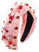 She finds her vintage story in this Radiant Gem-Studded Knotted Headband