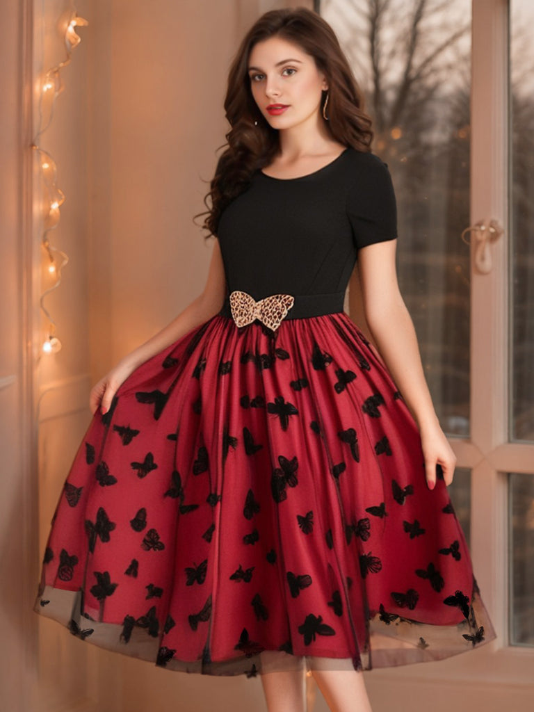 This Red 1950s Butterfly Embroidered Mesh Patchwork Dress wraps her in 1950s elegance, one twirl at a time
