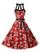 She slips into this Red 1950s Christmas Snowflake Halter Swing Dress and suddenly it's a 1950s daydream