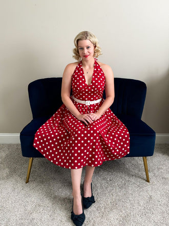 She slips into this Red 1950s Polka Dot Halter Dress and suddenly it's a 1950s daydream