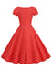 This Red 1950s Polka Dot Sweetheart Neck Bow Dress wraps her in 1950s elegance, one twirl at a time