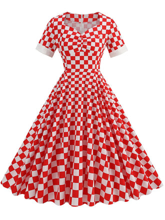 She slips into this Red 1950s Sweetheart Neck Plaids Dress and suddenly it's a 1950s daydream