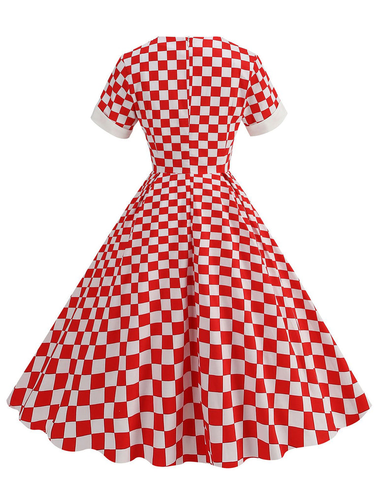 This Red 1950s Sweetheart Neck Plaids Dress wraps her in 1950s elegance, one twirl at a time