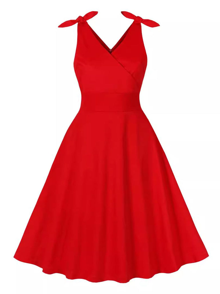 She slips into this Red 1950s V-Neck Sleeveless Solid Dress and suddenly it's a 1950s daydream