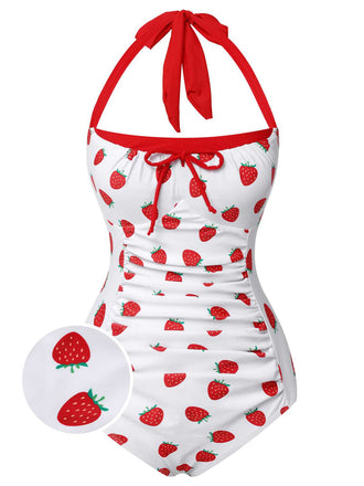 She's wearing Red 1960s Halter Bow Strawberry One-Piece Swimsuit and the whole beach remembers the 1960s