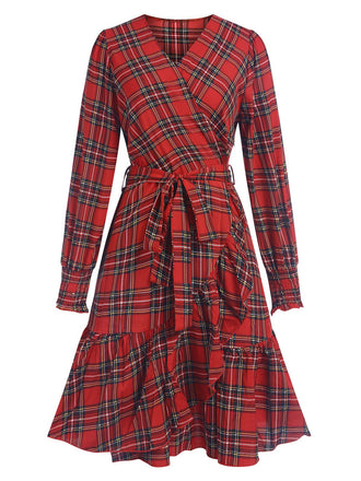 She slips into this Red 1960s Tartan Plaids Ruffle Hem Belted Dress and suddenly it's a 1960s daydream