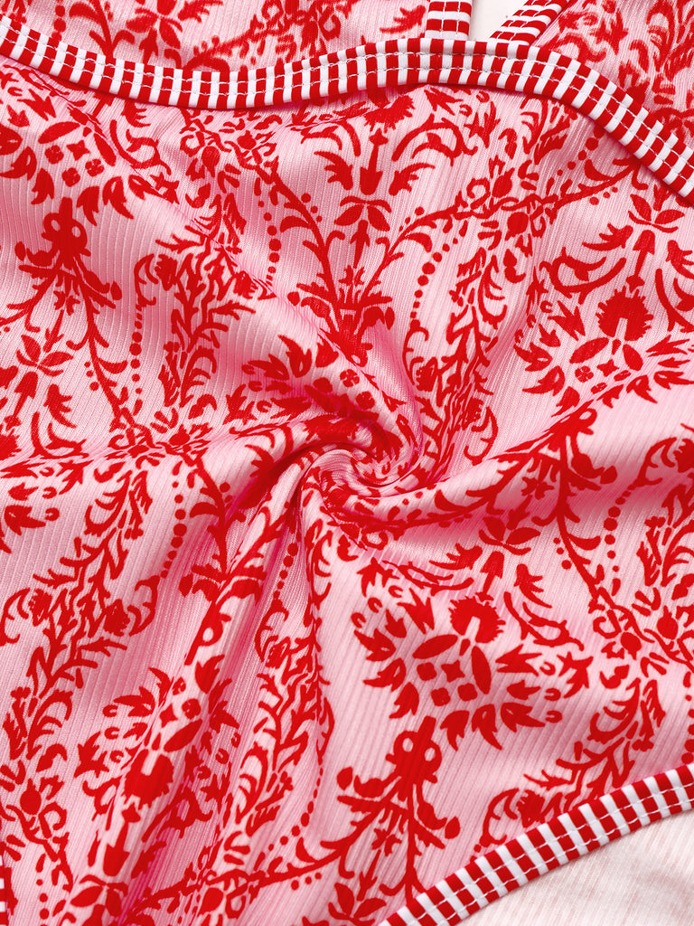 This Red 1970s Deep V-Neck Halter Baroque Prints Swimsuit carries 1970s vacation dreams in every stitch