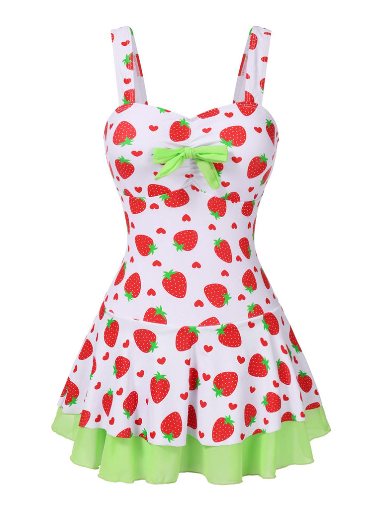 This Red & Green 1940s Strawberry Bow Swim Dress wraps her in 1940s elegance, one twirl at a time