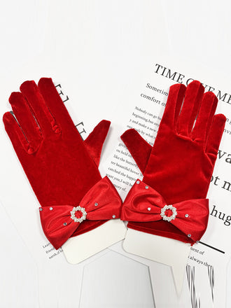 She adds this Red Velvet Rhinestone Bow Gloves and suddenly it's vintage perfection