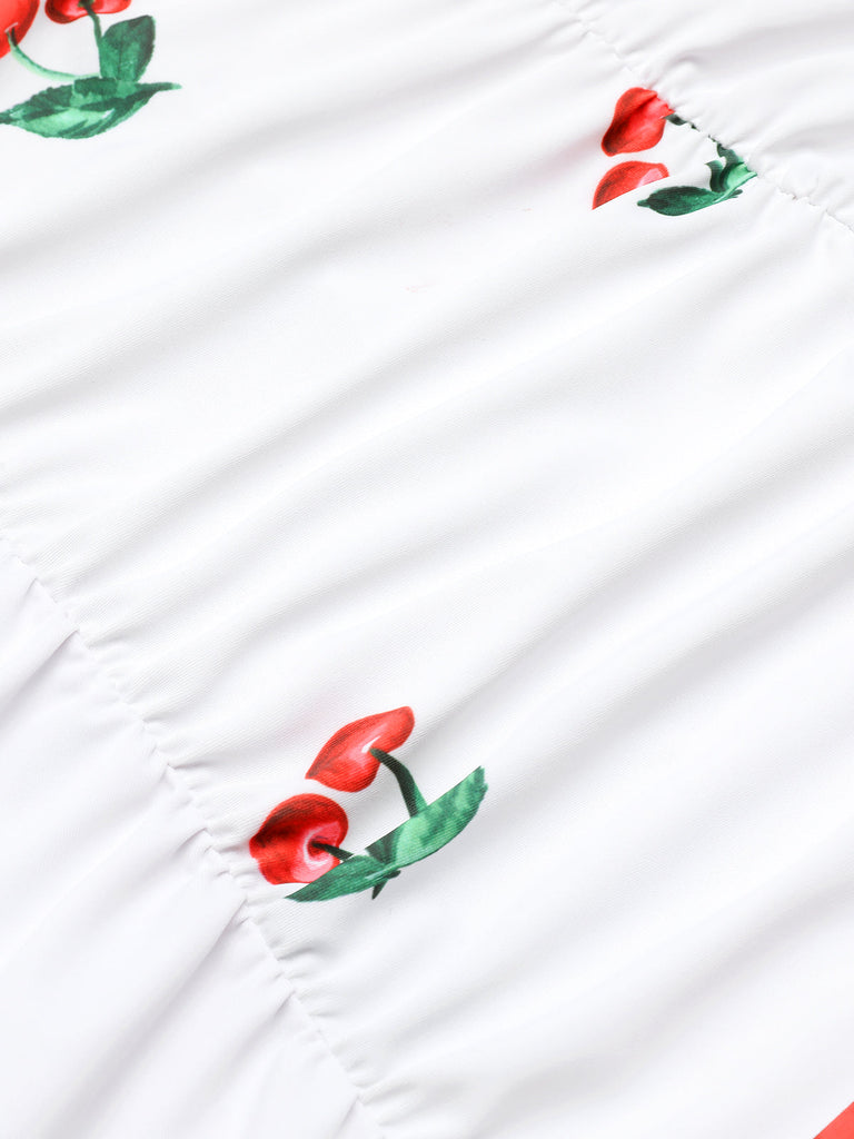 This Retro Cherry Summer One-piece Swimsuit carries 1950s vacation dreams in every stitch