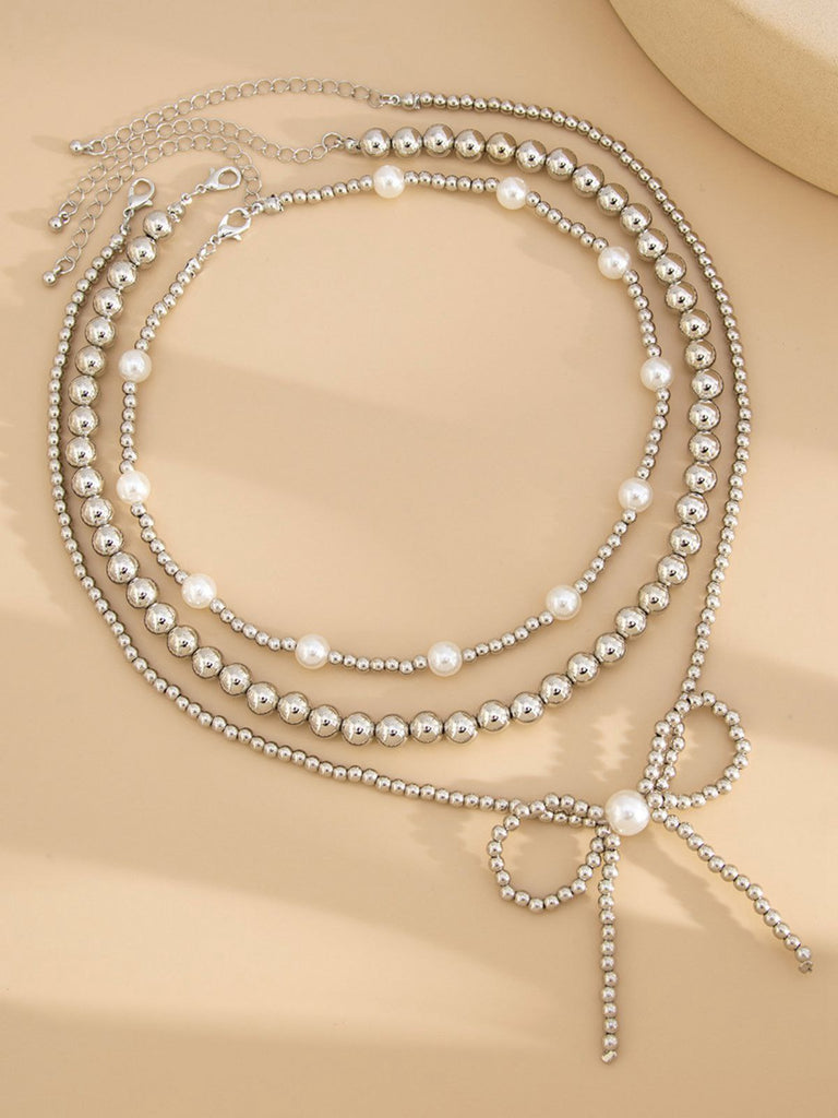 Retro Beads Bow Layered Necklace: 1950s detail work for the woman who notices