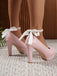 She finds her 1950s story in this Retro Solid Color Strap Bow High Heels