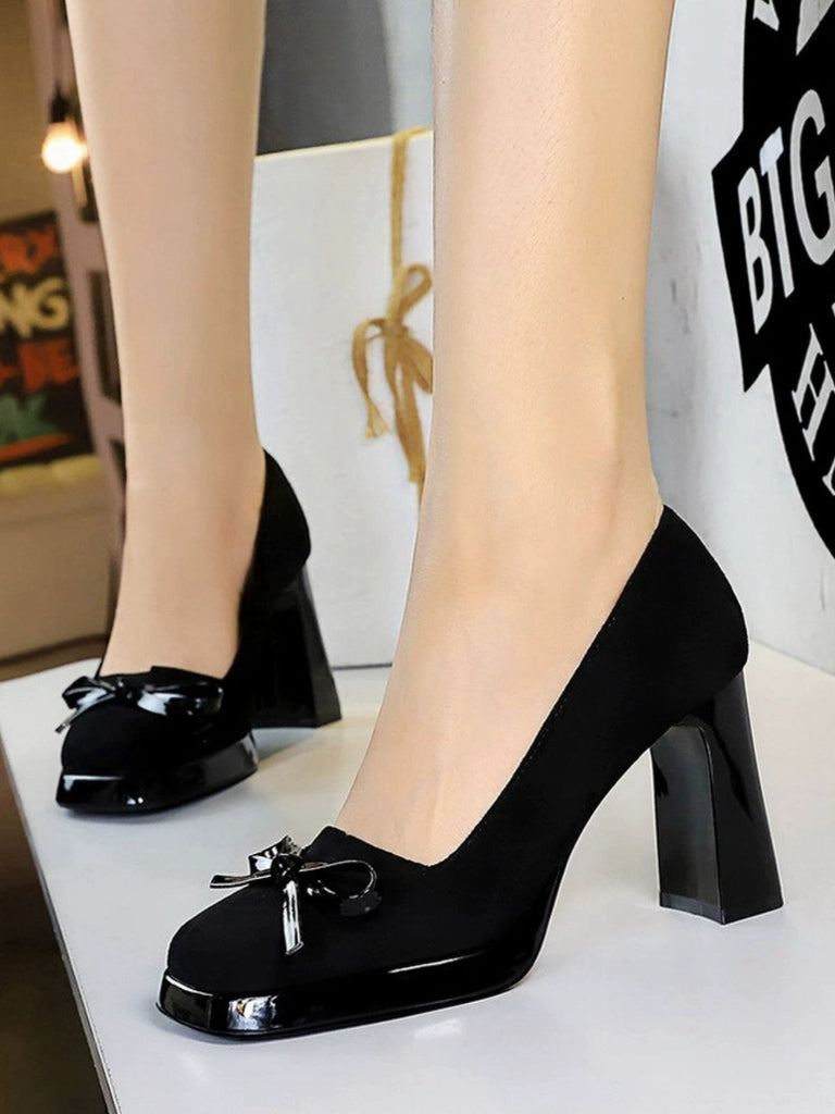 She finds her 1950s story in this Retro Suede Bowknot Chunky High Heels