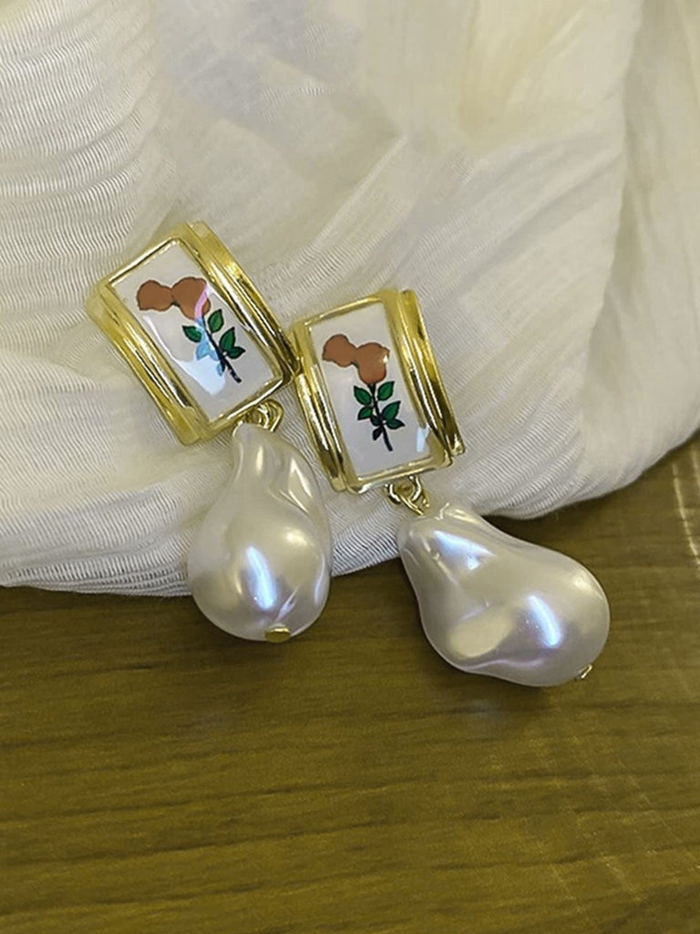 This Rose Baroque Pearl Pendant Earrings carries vintage stories waiting to be told