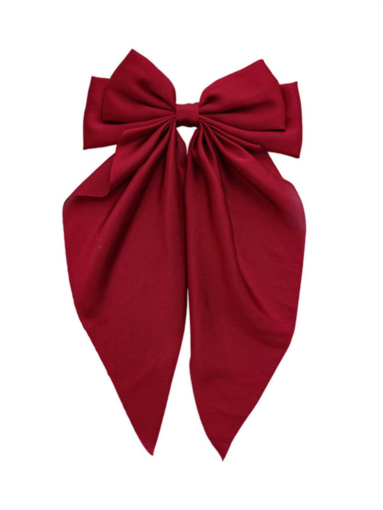 She finds her vintage story in this Satin Ribbon Solid Bow Hairpin