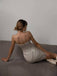 Silver 1970s Bandeau Sequin Pencil Dress — a 1970s silhouette that turns sidewalks into runways