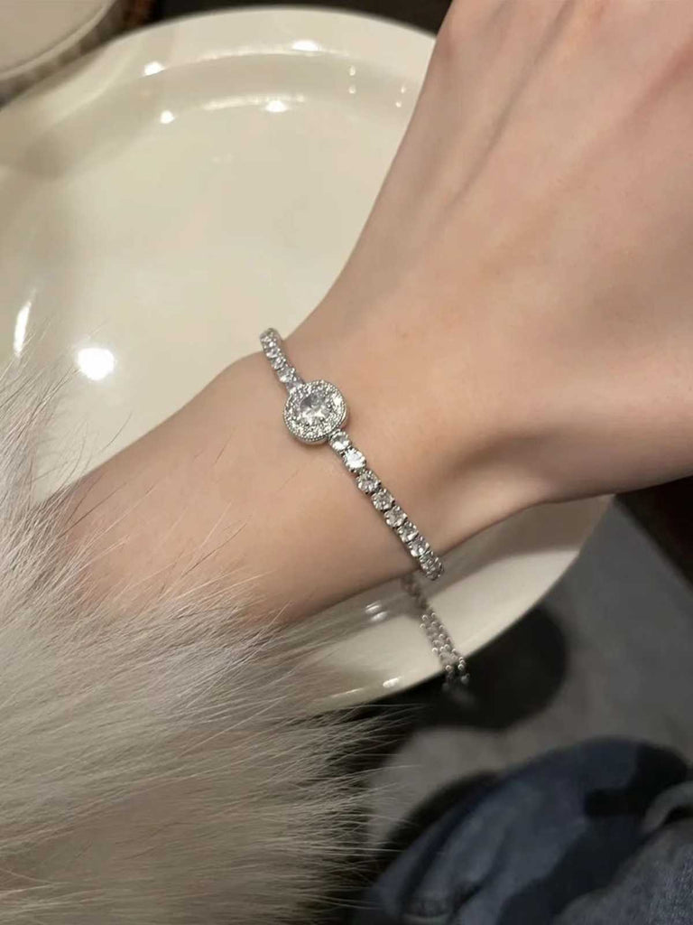 She slips into Silver Alloy Diamond Bracelet and channels vintage screen sirens