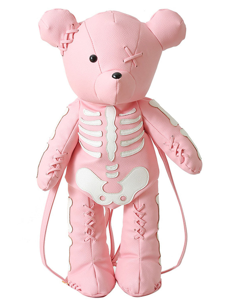 She finds her vintage story in this Skull Violent Teddy Bear Backpack