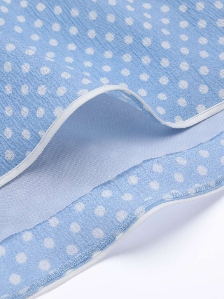 This Sky Blue 1950s Strap Polka Dot Swing Dress wraps her in 1950s elegance, one twirl at a time