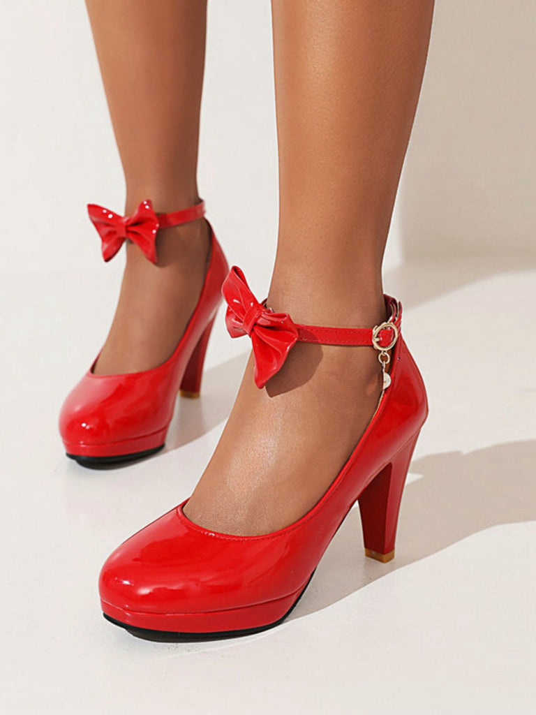 This Solid Leather Bowknot Buckle Strap Chunky Heels whispers vintage secrets to those who notice