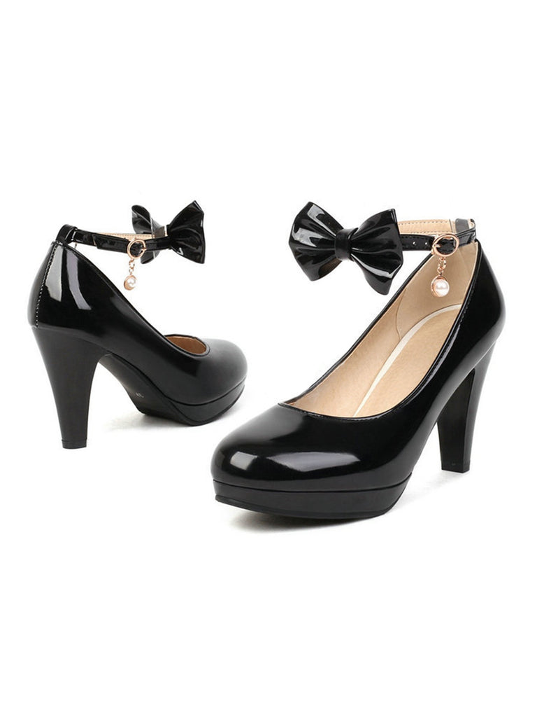 She finds her vintage story in this Solid Leather Bowknot Buckle Strap Chunky Heels