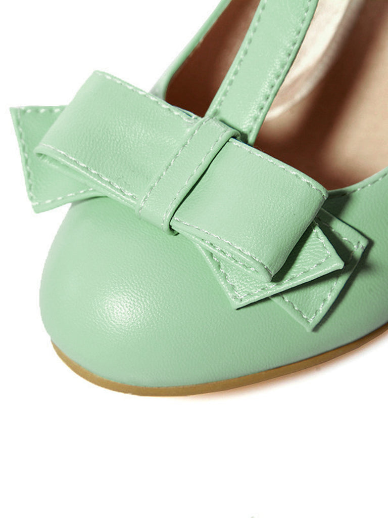 This Solid Leather Bowknot T-Strap Chunky Heels whispers vintage secrets to those who notice