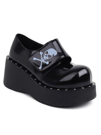 She finds her 1950s story in this Vintage Black Toxic Skull Platform Shoes
