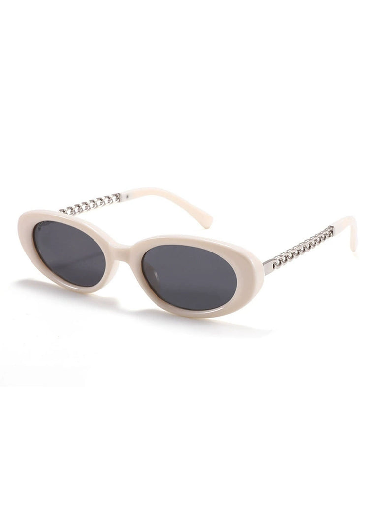 She finds her 1950s story in this Vintage Chain Temple Oval Sunglasses