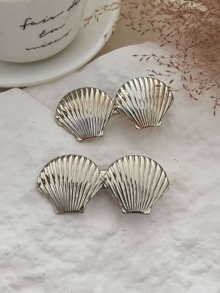 This Vintage Double Shell Metal Hairpin whispers 1950s secrets to those who notice