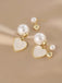 Vintage Gold Edged Pearl Heart Earrings — 1950s elegance in the palm of her hand