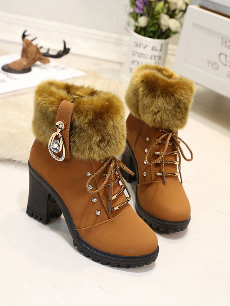 She finds her 1950s story in this Vintage Nubuck Leather Plush Chunky Heel Boots
