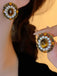 She adds this Vintage Olive Yellow Diamond Pearl Earrings and suddenly it's 1950s perfection