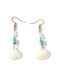 She adds this Vintage Pearl Seashell Drop Earrings and suddenly it's 1950s perfection