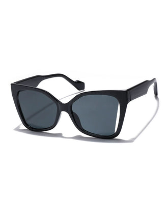 She finds her 1950s story in this Vintage Plastic Square Frame Sunglasses