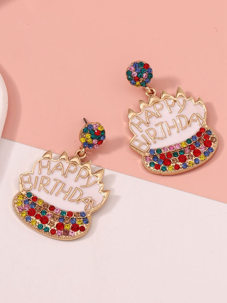 She adds this Vintage Rhinestone Birthday Cake Earrings and suddenly it's 1950s perfection