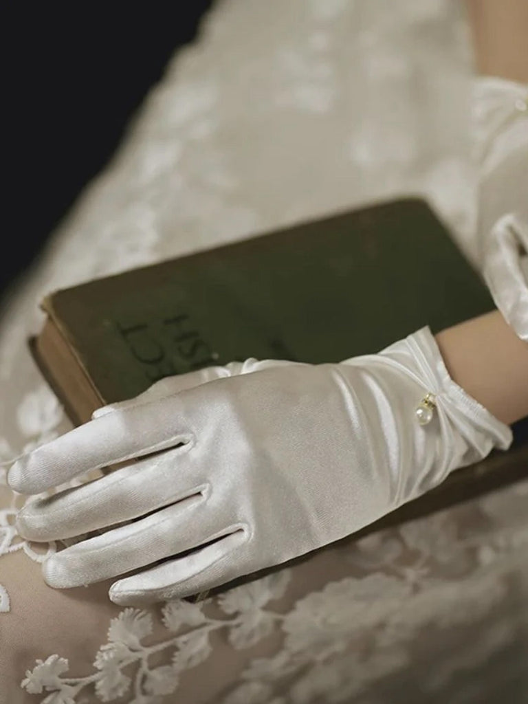 She adds this Vintage Solid Stretch Satin Short Gloves and suddenly it's 1950s perfection