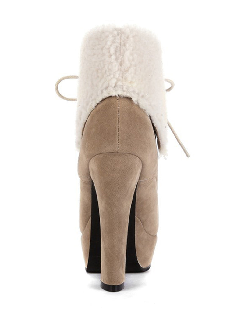 She finds her 1950s story in this Vintage Suede Faux Fur High Heel Ankle Boots
