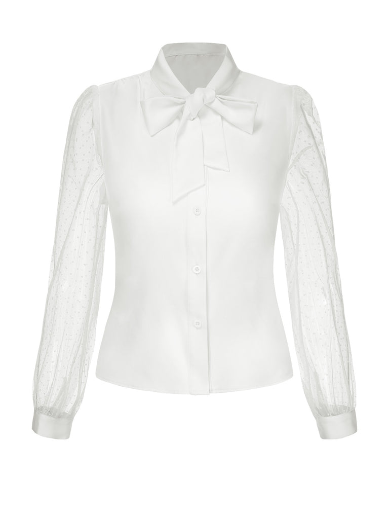 This White 1940s Tie Neck Mesh Swiss Dots Blouse brings 1940s soul to her everyday