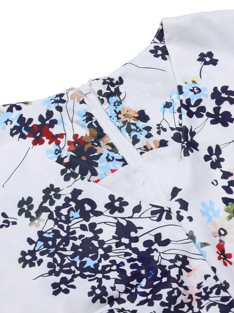 White 1940s V-Neck Floral Belted Sleeveless Dress — the kind of 1940s dress that makes strangers smile