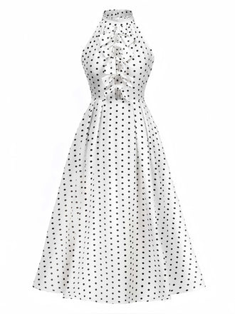 She slips into this White 1950s Halter Polka Dots Bow Dress and suddenly it's a 1950s daydream
