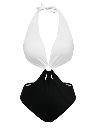 She's wearing White 1960s Halter Deep V-Neck One-Piece Swimsuit and the whole beach remembers the 1960s