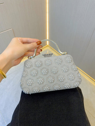 White 1970s Vintage Pearl Clutch Bags - vintage fashion, retro style, classic elegance for vintage lovers