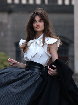 She slips into this White & Gray 1950s Lace-Up Swing Dress and suddenly it's a 1950s daydream