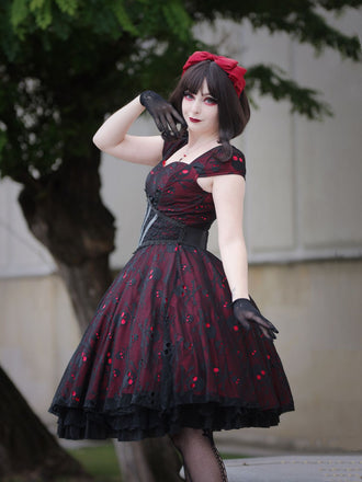 She slips into this Wine Red 1950s Skull Mesh Swing Dress and suddenly it's a 1950s daydream