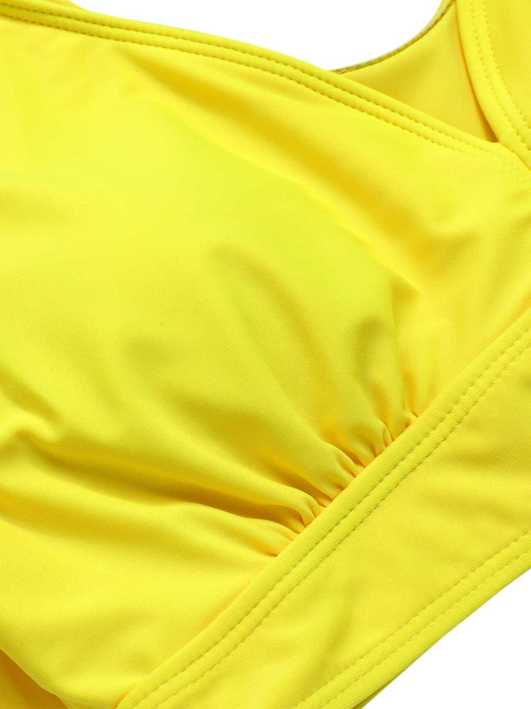 She's wearing Yellow 1940s Ruffles Floral Swimsuit and the whole beach remembers the 1940s